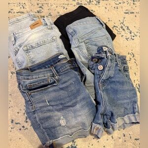 Four pairs of shorts one pair of jeans size 10-12 girls